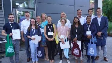 Jury and participants with awards